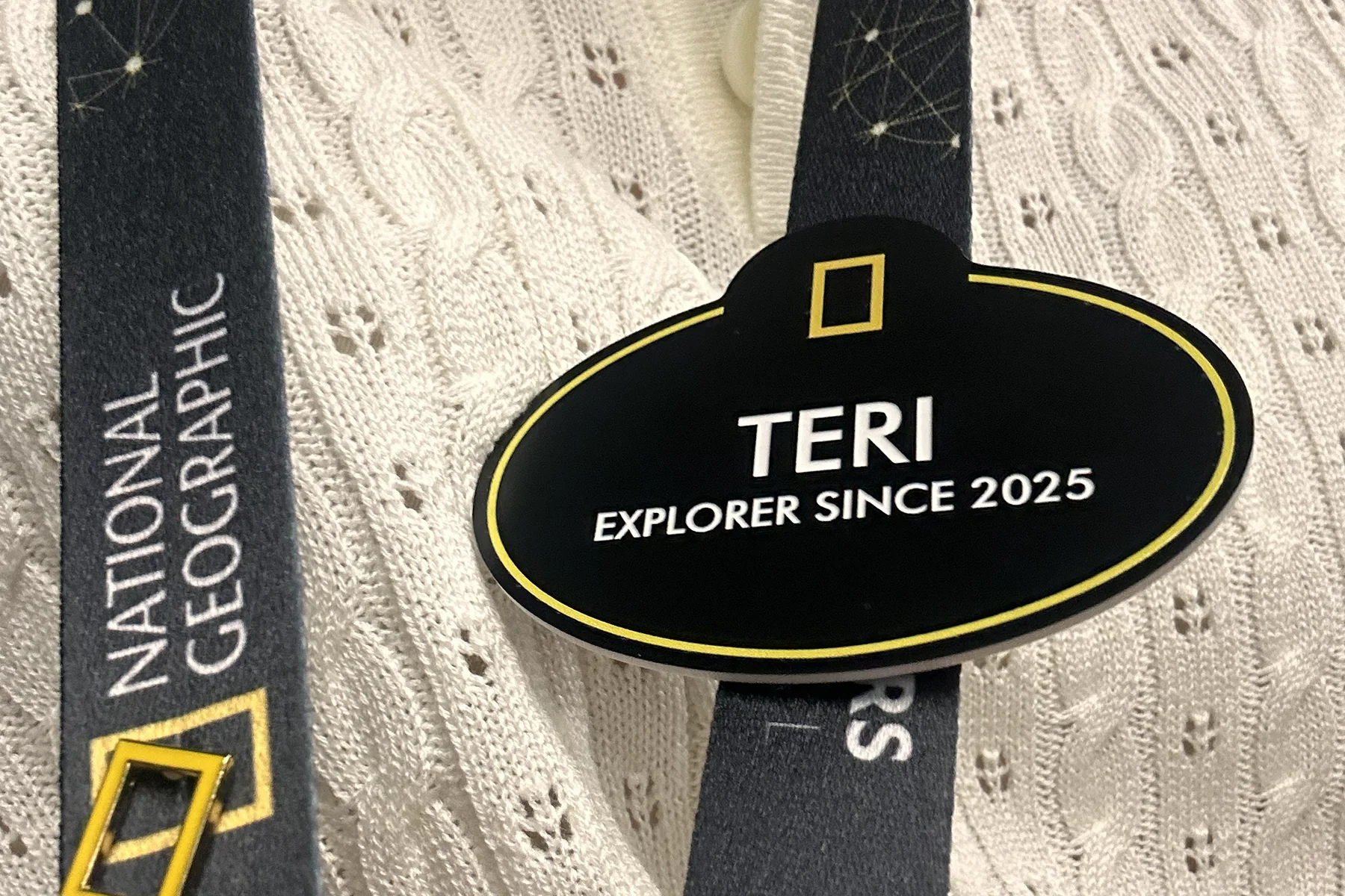 My name badge on a National Geographic lanyard, reading Teri, Explorer since 2025, with the yellow rectangle above it